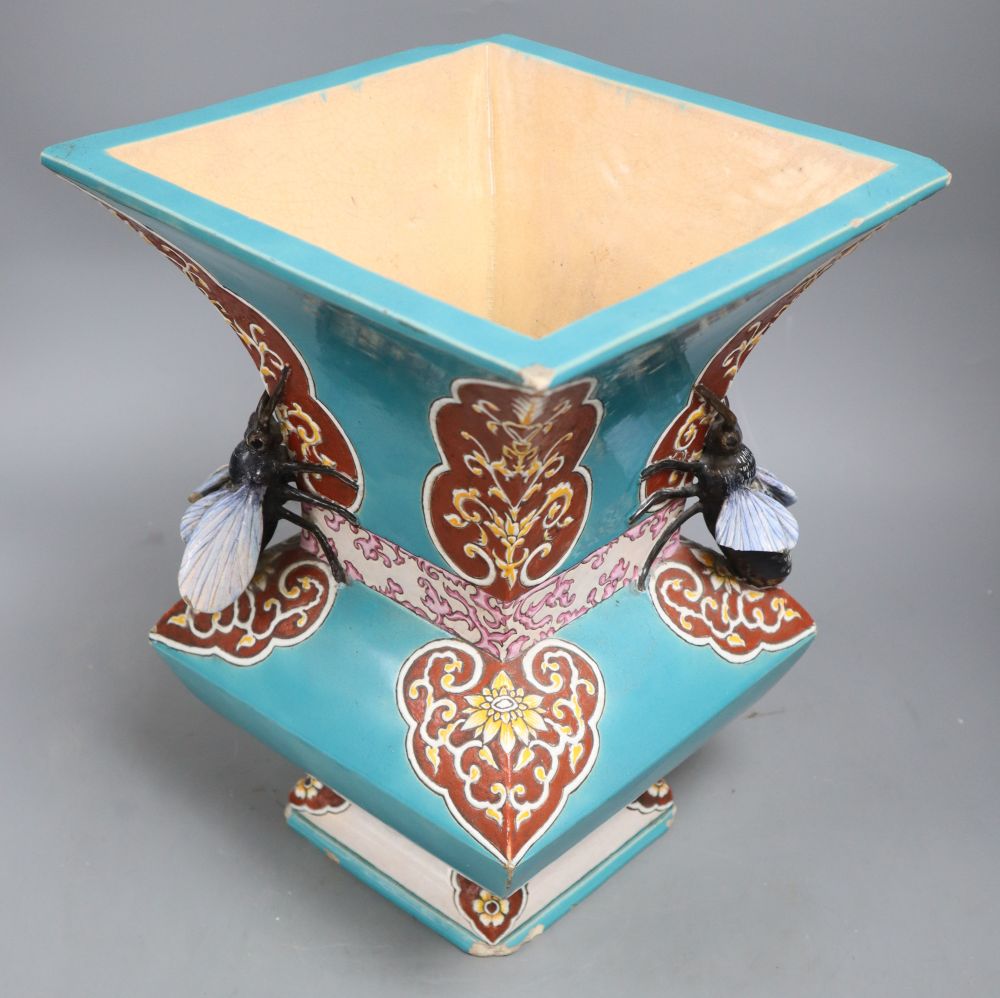 Eugene Collinot. A 19th century French turquoise glazed pottery vase with bee decoration, height 32cm